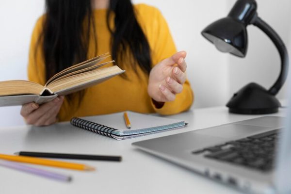 close-up-woman-holding-book_23-2148888819.jpg Teaching Methods Core