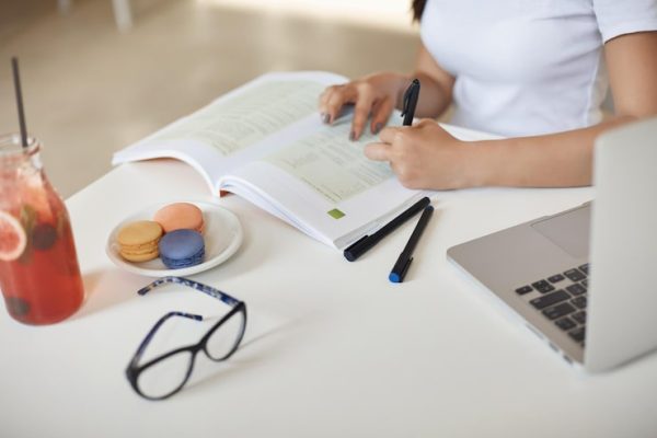 cropped-shot-woman-hands-writing-down-notes-student-sit-cafe_197531-30660.jpg Study Skills Basics